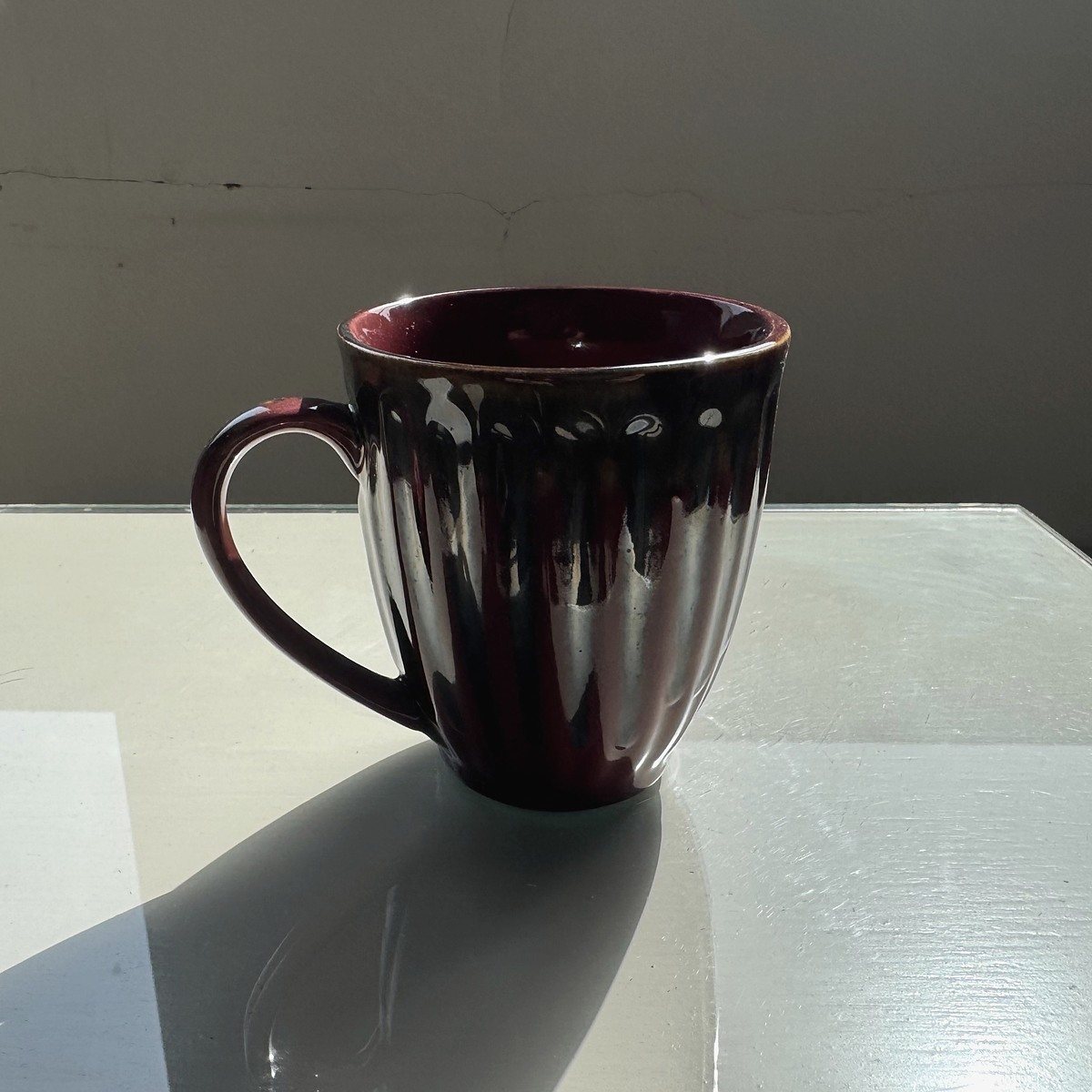 Deep plum glazed ribbed ceramic mug